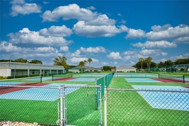 This METICULOUSLY-MAINTAINED *condo-villa* with a BRAND NEW ROOF on Myerlee Country Club in Florida - for sale on GolfHomes.com, golf home, golf lot