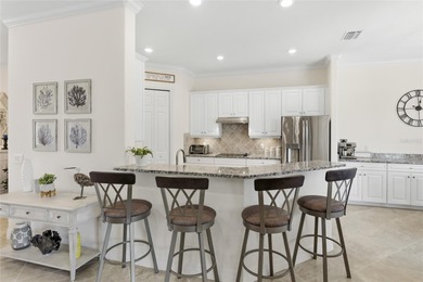 Experience tranquility in this beautiful estate home, nestled on on Plantation Golf and Country Club in Florida - for sale on GolfHomes.com, golf home, golf lot