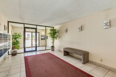 Experience luxury living in this fully remodeled 1-bedroom on Scottsdale Shadows in Arizona - for sale on GolfHomes.com, golf home, golf lot