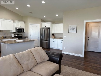 Charming duplex in a desirable neighborhood, on a quiet street on Blackfoot Municipal Golf Course in Idaho - for sale on GolfHomes.com, golf home, golf lot