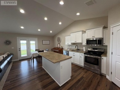 Charming duplex in a desirable neighborhood, on a quiet street on Blackfoot Municipal Golf Course in Idaho - for sale on GolfHomes.com, golf home, golf lot