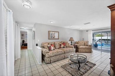 Lovingly maintained 3-bedroom, 2-bath pool home in Venice on Capri Isle Golf Club in Florida - for sale on GolfHomes.com, golf home, golf lot