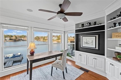 LIVE LIKE YOU ARE ON VACATION on Lake Windward with private dock on The Golf Club of Georgia in Georgia - for sale on GolfHomes.com, golf home, golf lot