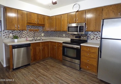 Inviting patio home in a vibrant 55+ active adult community! on Sunland Village Golf Club in Arizona - for sale on GolfHomes.com, golf home, golf lot