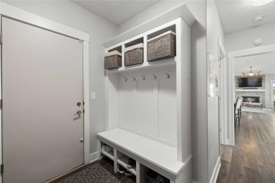 This zero-entry ranch home offers a blend of comfort and modern on Otter Creek Golf Course in Iowa - for sale on GolfHomes.com, golf home, golf lot
