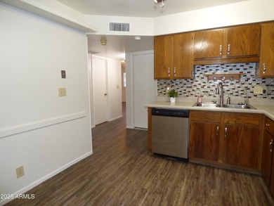 Inviting patio home in a vibrant 55+ active adult community! on Sunland Village Golf Club in Arizona - for sale on GolfHomes.com, golf home, golf lot