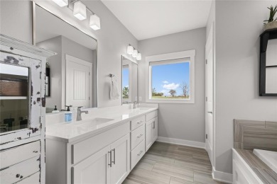 This zero-entry ranch home offers a blend of comfort and modern on Otter Creek Golf Course in Iowa - for sale on GolfHomes.com, golf home, golf lot