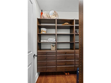 LIVE LIKE YOU ARE ON VACATION on Lake Windward with private dock on The Golf Club of Georgia in Georgia - for sale on GolfHomes.com, golf home, golf lot