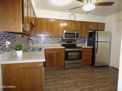 Inviting patio home in a vibrant 55+ active adult community! on Sunland Village Golf Club in Arizona - for sale on GolfHomes.com, golf home, golf lot