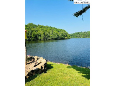Bring your RV to this charming mountain retreat in Linvile Land on Land Harbor Golf Course in North Carolina - for sale on GolfHomes.com, golf home, golf lot