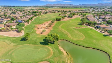 Wonderful home in the sought after Trilogy 55+ golf course on Trilogy Golf Club At Power Ranch in Arizona - for sale on GolfHomes.com, golf home, golf lot