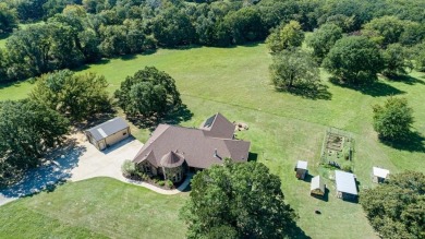 Only 50 miles from Dallas, this gorgeous stone brick home was on Indian Oaks Golf Club in Texas - for sale on GolfHomes.com, golf home, golf lot