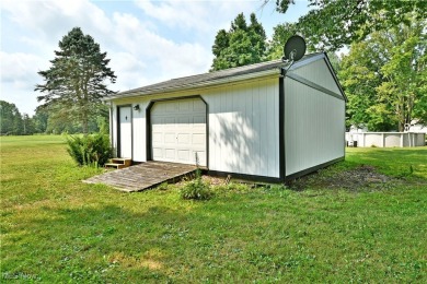 Capture the best part of the summer heat with this sizzling on Westgate Golf Center in Ohio - for sale on GolfHomes.com, golf home, golf lot