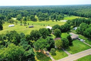 Capture the best part of the summer heat with this sizzling on Westgate Golf Center in Ohio - for sale on GolfHomes.com, golf home, golf lot