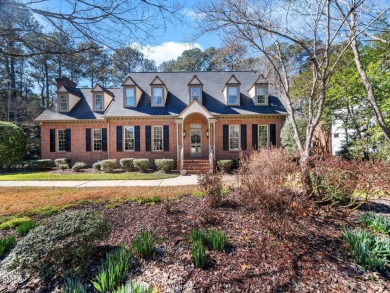 This charming Williamsburg-style custom-built home in the highly on Lochmere Golf Club in North Carolina - for sale on GolfHomes.com, golf home, golf lot