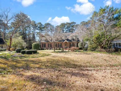 This charming Williamsburg-style custom-built home in the highly on Lochmere Golf Club in North Carolina - for sale on GolfHomes.com, golf home, golf lot