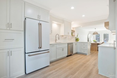 Beautifully remodeled townhome in a serene golf course community on Perdido Bay Golf Club in Florida - for sale on GolfHomes.com, golf home, golf lot