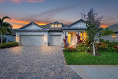 Nestled within the sought after golf course gated community of on River Wilderness Golf and Country Club in Florida - for sale on GolfHomes.com, golf home, golf lot