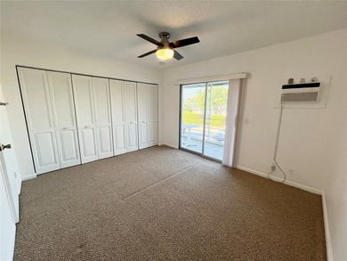 Immaculately maintained with newer updates! Move right into this on Hillsboro Pines Golf in Florida - for sale on GolfHomes.com, golf home, golf lot