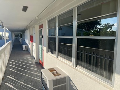 Immaculately maintained with newer updates! Move right into this on Hillsboro Pines Golf in Florida - for sale on GolfHomes.com, golf home, golf lot