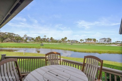 Discover the perfect coastal retreat at 123 Ocean Point Drive on Ocean Point Golf Links in South Carolina - for sale on GolfHomes.com, golf home, golf lot