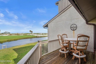 Discover the perfect coastal retreat at 123 Ocean Point Drive on Ocean Point Golf Links in South Carolina - for sale on GolfHomes.com, golf home, golf lot