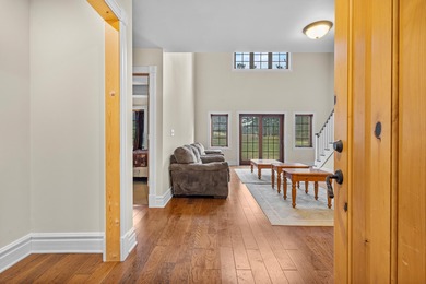 Unit 7 - Elevated Comfort in Green Lake This 3 bed, 3 bath condo on Tuscumbia Golf and Country Club in Wisconsin - for sale on GolfHomes.com, golf home, golf lot