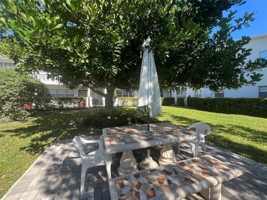 Immaculately maintained with newer updates! Move right into this on Hillsboro Pines Golf in Florida - for sale on GolfHomes.com, golf home, golf lot