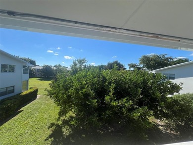 Immaculately maintained with newer updates! Move right into this on Hillsboro Pines Golf in Florida - for sale on GolfHomes.com, golf home, golf lot