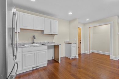 Unit 7 - Elevated Comfort in Green Lake This 3 bed, 3 bath condo on Tuscumbia Golf and Country Club in Wisconsin - for sale on GolfHomes.com, golf home, golf lot