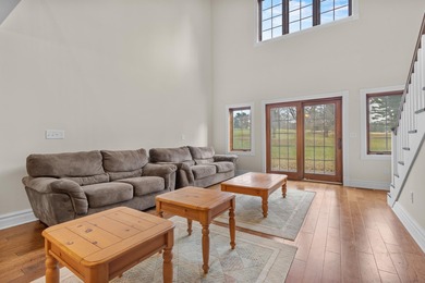 Unit 7 - Elevated Comfort in Green Lake This 3 bed, 3 bath condo on Tuscumbia Golf and Country Club in Wisconsin - for sale on GolfHomes.com, golf home, golf lot