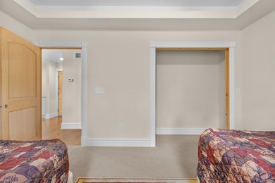 Unit 7 - Elevated Comfort in Green Lake This 3 bed, 3 bath condo on Tuscumbia Golf and Country Club in Wisconsin - for sale on GolfHomes.com, golf home, golf lot