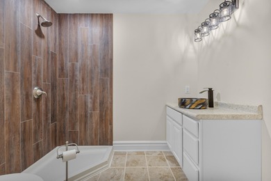 Unit 7 - Elevated Comfort in Green Lake This 3 bed, 3 bath condo on Tuscumbia Golf and Country Club in Wisconsin - for sale on GolfHomes.com, golf home, golf lot