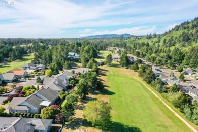 Nestled within a serene, gated community overlooking the 10th on Ocean Dunes Golf Links in Oregon - for sale on GolfHomes.com, golf home, golf lot