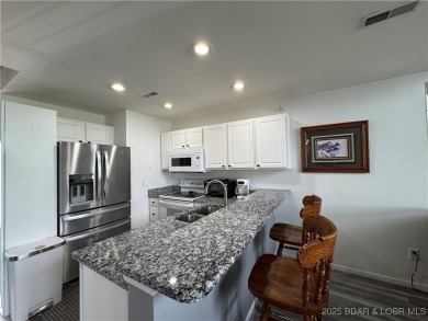 Cedar Glen has a way of helping you forget the daily buzz of on Lake Valley Country Club in Missouri - for sale on GolfHomes.com, golf home, golf lot