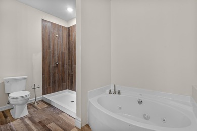 Unit 7 - Elevated Comfort in Green Lake This 3 bed, 3 bath condo on Tuscumbia Golf and Country Club in Wisconsin - for sale on GolfHomes.com, golf home, golf lot