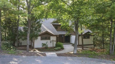 Welcome to your mountain retreat in the heart of Boyne Mountain on Boyne Mountain Resort - Alpine in Michigan - for sale on GolfHomes.com, golf home, golf lot