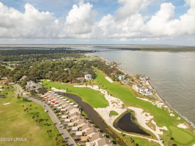 Discover the perfect coastal retreat at 123 Ocean Point Drive on Ocean Point Golf Links in South Carolina - for sale on GolfHomes.com, golf home, golf lot