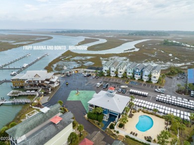 Discover the perfect coastal retreat at 123 Ocean Point Drive on Ocean Point Golf Links in South Carolina - for sale on GolfHomes.com, golf home, golf lot