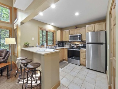Welcome to your mountain retreat in the heart of Boyne Mountain on Boyne Mountain Resort - Alpine in Michigan - for sale on GolfHomes.com, golf home, golf lot