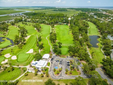 Discover the perfect coastal retreat at 123 Ocean Point Drive on Ocean Point Golf Links in South Carolina - for sale on GolfHomes.com, golf home, golf lot