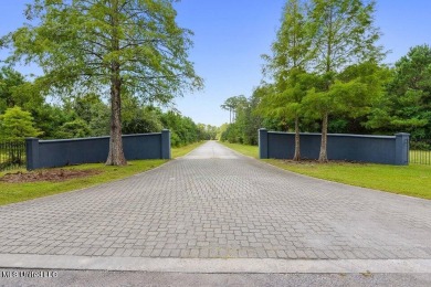 This secluded Bay St. Louis subdivision located in a tranquil on The Bridges Golf Club At Hollywood Casino in Mississippi - for sale on GolfHomes.com, golf home, golf lot