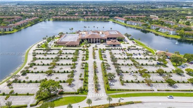 Enjoy spectacular lake and golf course views from this spacious on Flamingo Lakes Country Club in Florida - for sale on GolfHomes.com, golf home, golf lot