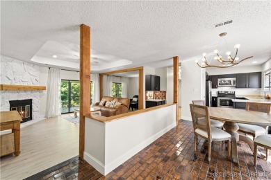 Welcome to this spacious yet cozy, 3 Bedroom, 2 Bath, end unit on Seasons Ridge At Four Seasons in Missouri - for sale on GolfHomes.com, golf home, golf lot