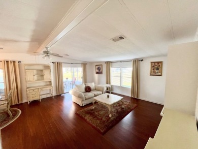 Enjoy water views from this beautiful 2-bedroom, 2-bathroom home on Lake Fairways Country Club in Florida - for sale on GolfHomes.com, golf home, golf lot