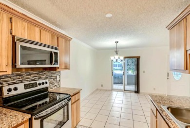 Discover this charming 2-bedroom, 2-bathroom villa in the on Cypress Lakes Golf Course - West Palm Beach in Florida - for sale on GolfHomes.com, golf home, golf lot