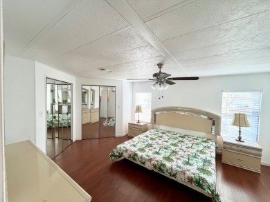 Enjoy water views from this beautiful 2-bedroom, 2-bathroom home on Lake Fairways Country Club in Florida - for sale on GolfHomes.com, golf home, golf lot