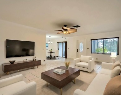 Discover this charming 2-bedroom, 2-bathroom villa in the on Cypress Lakes Golf Course - West Palm Beach in Florida - for sale on GolfHomes.com, golf home, golf lot