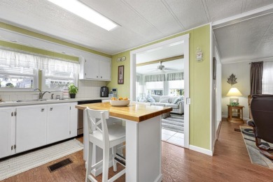 This furnished 2 bedroom, 2 bathroom home is situated on an on Maple Leaf Golf and Country Club in Florida - for sale on GolfHomes.com, golf home, golf lot