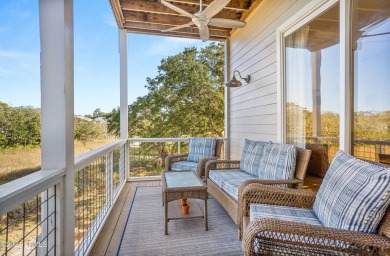 Enjoy coastal living with this charming 4-bedroom, 3-bathroom on Ocean Creek Golf Course in South Carolina - for sale on GolfHomes.com, golf home, golf lot